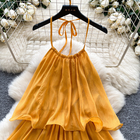 Adela Halterneck Ruffle Mini Dress - product shot, marigold orange - Miss Mosa By Akanksha