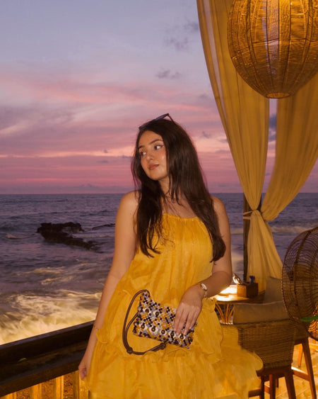Adela Halterneck Ruffle Mini Dress - three-quarter shot, marigold orange - Miss Mosa By Akanksha