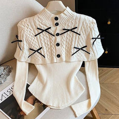 Adelie Luxe Sweater With Cape - flat-lay shot, cream with black bows - Miss Mosa By Akanksha