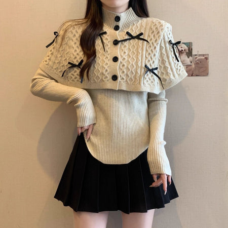 Adelie Luxe Sweater With Cape - front styled shot, cream with black bows - Miss Mosa By Akanksha