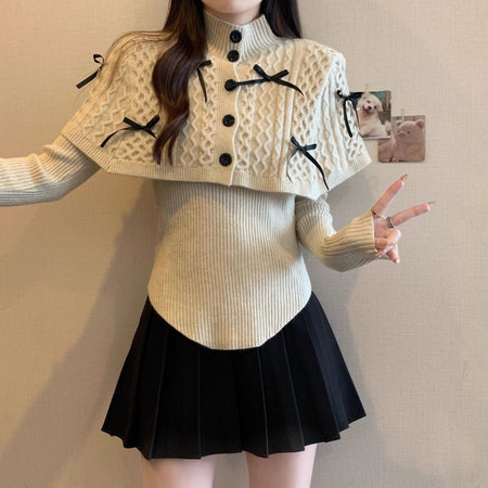 Adelie Luxe Sweater With Cape - front styled shot, cream with black bows - Miss Mosa By Akanksha