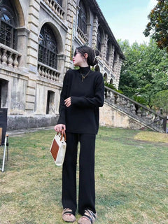 Adler Statement Winter Tracksets - full-length shot on model, black - Miss Mosa By Akanksha