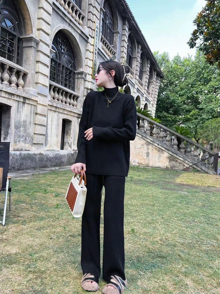 Adler Statement Winter Tracksets - full-length shot on model, black - Miss Mosa By Akanksha