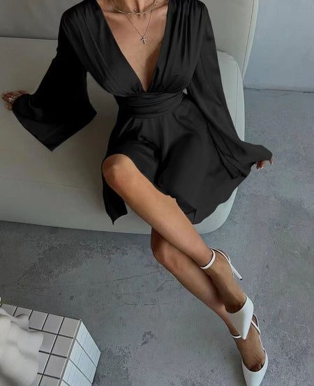 Agafiya Luxe Satin Dress In Black - seated overhead shot on model - Miss Mosa By Akanksha