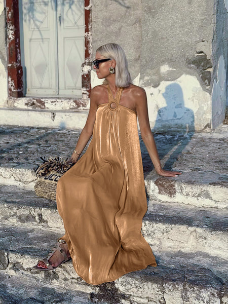 Agnes Halterneck Maxi Dress - seated full-length shot, gold - Miss Mosa By Akanksha