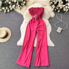 Agnia Offshoulder Jumpsuit - styled flat-lay shot, pink - Miss Mosa By Akanksha