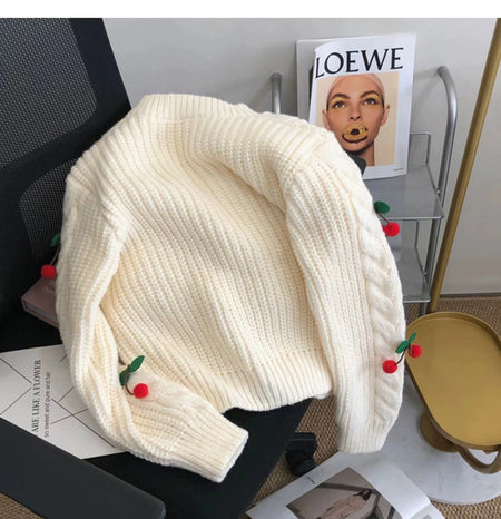 Alaine Statement Woolen Sweater with Cherry Detail - flat-lay shot on chair, cream - Miss Mosa By Akanksha