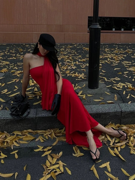 Alamea Offshoulder Statement Dress with Scarf in Red - styling shot on model seated outdoors - Miss Mosa By Akanksha
