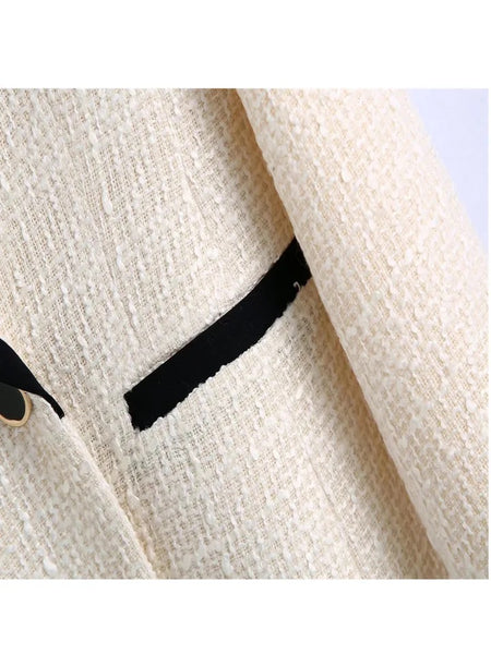Alamea Statement Tweed Blazer in White - close-up of tweed fabric texture, white - Miss Mosa By Akanksha