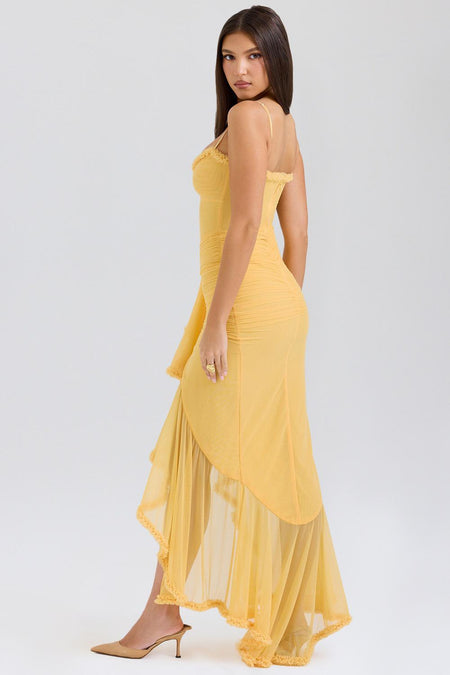 Alana Statement Bodycon Ruffled Dress In Yellow - side shot on model - Miss Mosa By Akanksha