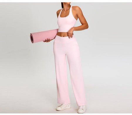 Alex Activewear Set In Pink - full-length front shot on model holding a yoga mat - Miss Mosa By Akanksha