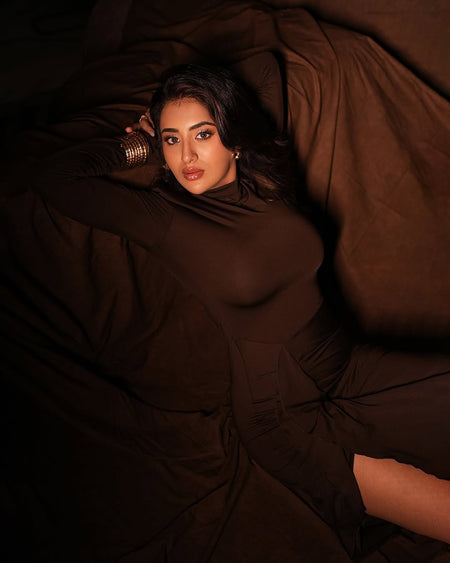 Alina Statement Slit Cut Maxi Dress In Brown - reclining shot on model on draped fabric - Miss Mosa By Akanksha