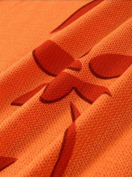Alloy Luxe Soft Knit Dress Resortwear In Orange - close-up of floral print detail - Miss Mosa By Akanksha