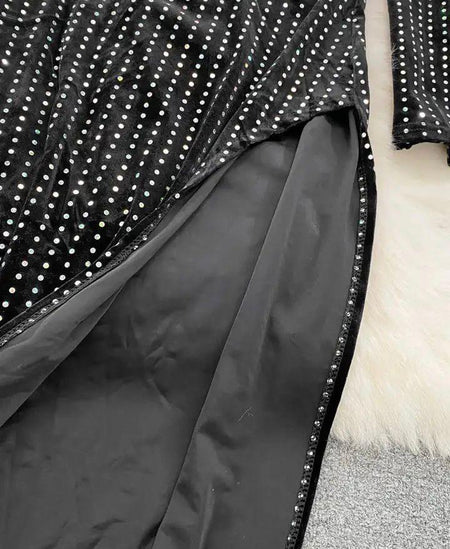 Anika Velvet Midi One Shoulder Dress In Black - close-up of side slit, black - Miss Mosa By Akanksha