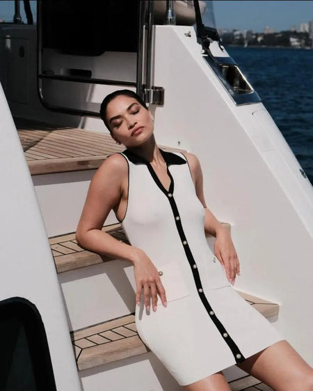 Anne Luxe Soft Mini Dress In Off White - front shot on model seated - Miss Mosa By Akanksha