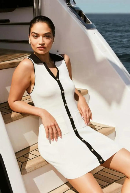 Anne Luxe Soft Mini Dress In Off White - side shot on model seated - Miss Mosa By Akanksha