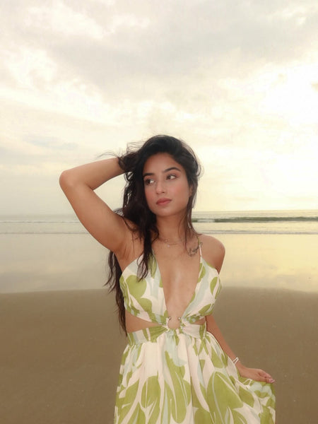 Arabella Floral Summer Maxi Dress In Olive - front shot on model at the beach - Miss Mosa By Akanksha
