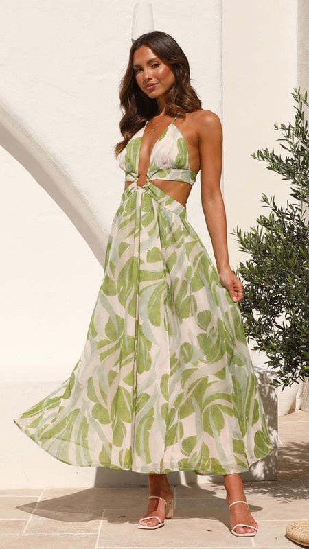 Arabella Floral Summer Maxi Dress In Olive - front shot on model at the beach - Miss Mosa By Akanksha