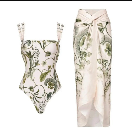Aralia Swimsuit With Sarong In White - flat-lay product shot of swimsuit and sarong - Miss Mosa By Akanksha