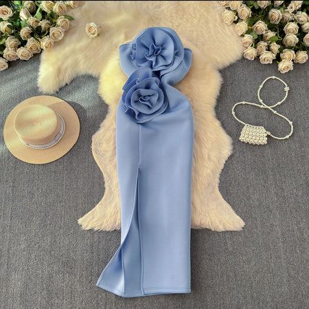 Arrow Statement Dress In Blue - flat-lay product shot of dress with rosette detail - Miss Mosa By Akanksha