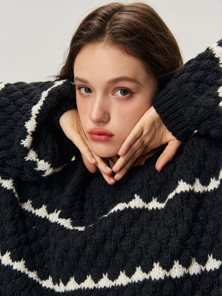 Aubin Statement Pullover - close-up shot on model, black and off-white - Miss Mosa By Akanksha