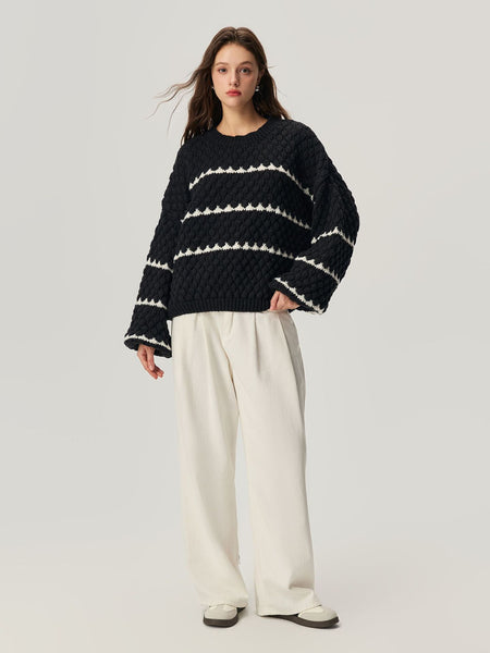 Aubin Statement Pullover - front shot on model, black and off-white - Miss Mosa By Akanksha