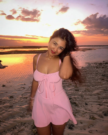 Beccy Summer Lace Up Holiday Dress - lifestyle shot on model, pink - Miss Mosa By Akanksha