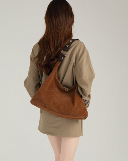 Bjorn Suede Tote Bag - back shot on model, tan - Miss Mosa By Akanksha