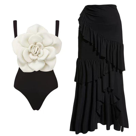 Camellia Rosette Swimsuit with Ruffled Skirt - styled flat-lay shot, black - Miss Mosa By Akanksha