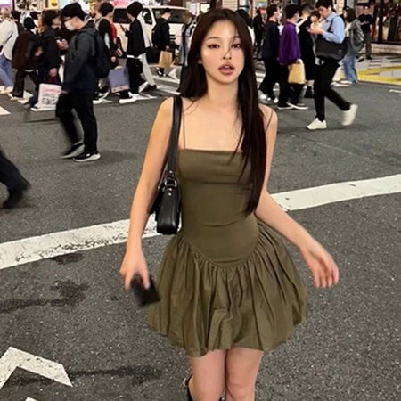 Camille Statement Balloon Dress In Olive - front walking shot on model - Miss Mosa By Akanksha