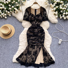 Canan Embossed Floral Padded Dress - flat-lay product shot of dress on hanger, black and beige - Miss Mosa By Akanksha