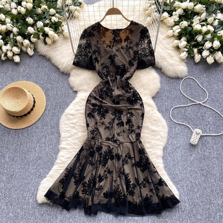 Canan Embossed Floral Padded Dress - flat-lay product shot of dress on hanger, black and beige - Miss Mosa By Akanksha