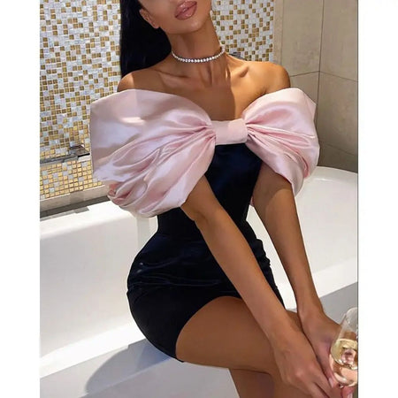 Candy Statement Bow Dress In Navy Blue - front shot on model showing bow bodice - Miss Mosa By Akanksha