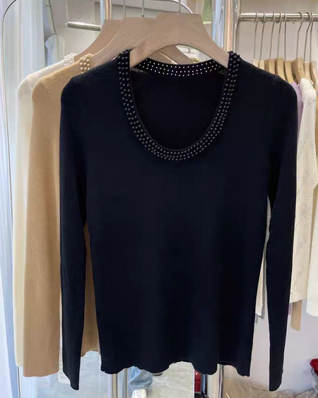 Caroline Pearl Soft Knit Pullover - front product shot on hanger rail, black - Miss Mosa By Akanksha