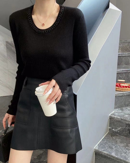 Caroline Pearl Soft Knit Pullover - front shot on model, black - Miss Mosa By Akanksha