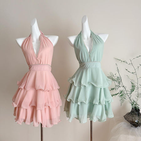 Carys Halterneck Pearl Ruffle Mini Dress - full-length front shot of both colourways side by side, pink and mint green - Miss Mosa By Akanksha