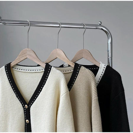 Caspian Buttoned Sweaters - front shot on hanger, cream - Miss Mosa By Akanksha