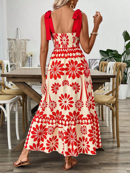 Catherine Floral Holiday Dress In Orange - back shot on model indoors - Miss Mosa By Akanksha