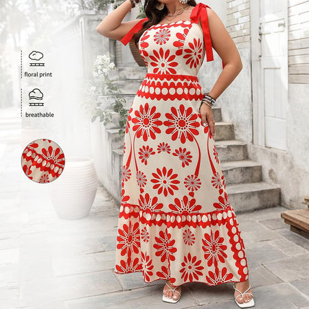Catherine Floral Holiday Dress In Orange - front shot on model with fabric detail inset - Miss Mosa By Akanksha