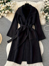 Catrina Winter Shrug With Belt In Black - flat-lay product shot on hanger - Miss Mosa By Akanksha