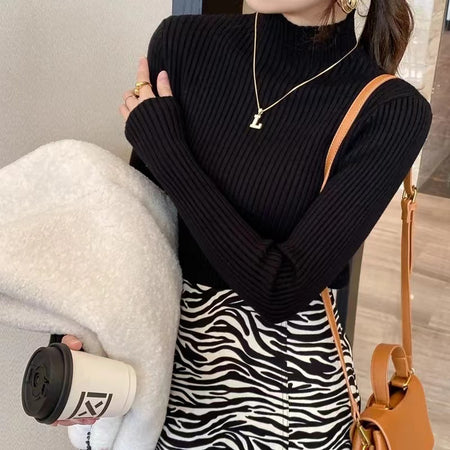 Champel Statement Turtleneck Sweater - front shot on model, black - Miss Mosa By Akanksha