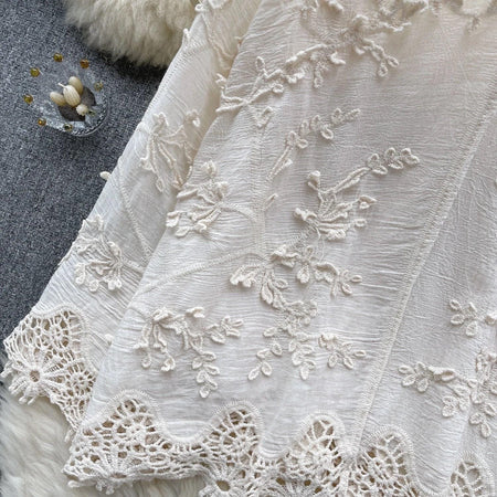 Cia Embroidered Cotton Shirt In Beige - close-up of fabric and lace hem detail - Miss Mosa By Akanksha