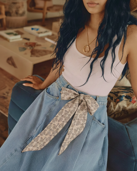 Cleo Denim Midi Skirt - seated shot, light blue denim - Miss Mosa By Akanksha