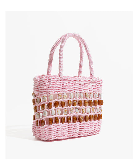 Coco Straw Beads Hand Bag With Pouch - angled shot, pink with amber and cream shell beads - Miss Mosa By Akanksha
