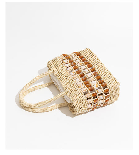 Coco Straw Beads Hand Bag With Pouch - angled flat-lay shot, beige with amber and cream shell beads - Miss Mosa By Akanksha