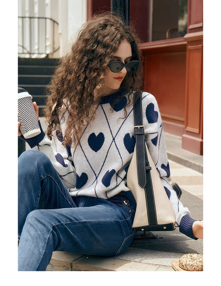 Cosette Heart Woolen Sweater - front shot on model seated, off-white and navy blue - Miss Mosa By Akanksha