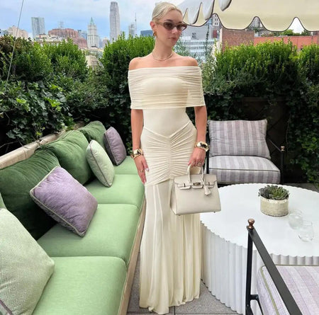Cosmic Offshoulder Ruched Maxi Dress In Off-White - front shot on model - Miss Mosa By Akanksha