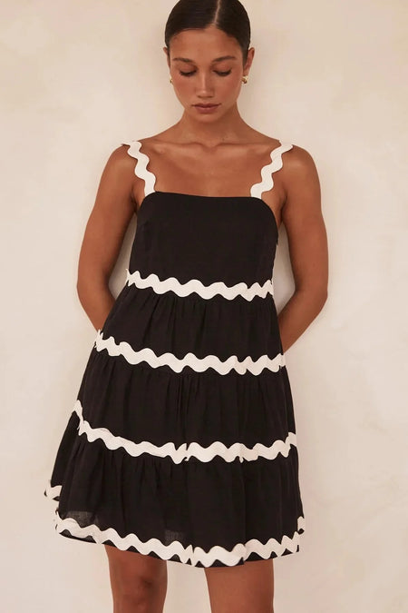 Coya Statement Holiday Dress In Black - front shot on model, black - Miss Mosa By Akanksha