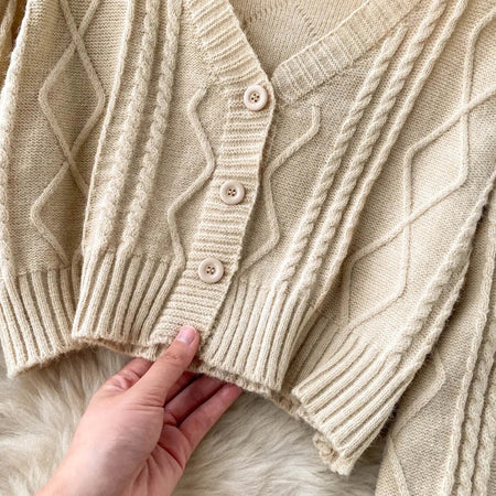Cyra Premium Woolen Sweater Set In Beige - close-up of button placket held in hand - Miss Mosa By Akanksha