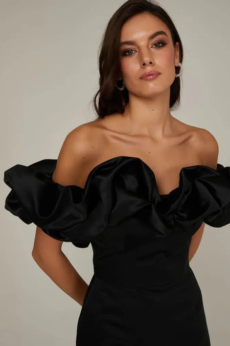 Cyrene Ruffle Off Shoulder Dress - close-up shot on model, black - Miss Mosa By Akanksha